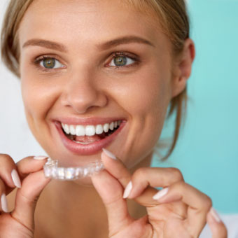 lady with Invisalign